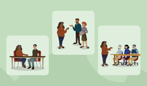 A manager talks with members of her team. In one scene she sits at a desk with a man. In another she is standing talking to a man and woman. In the third she is talking to a group of people sitting at a table. 