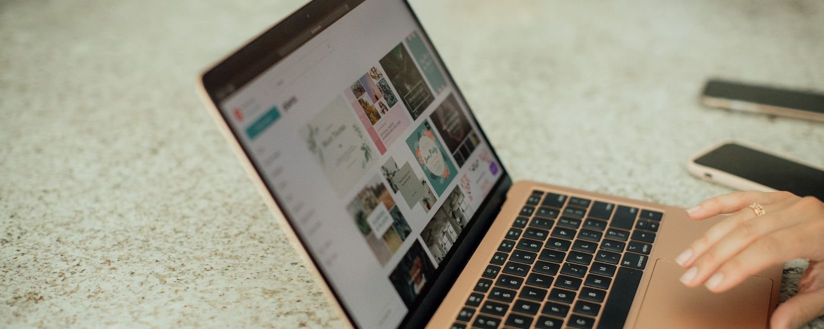 A laptop with the Canva website on screen