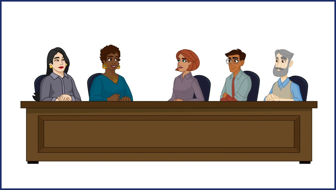 group of people talking at a conference table